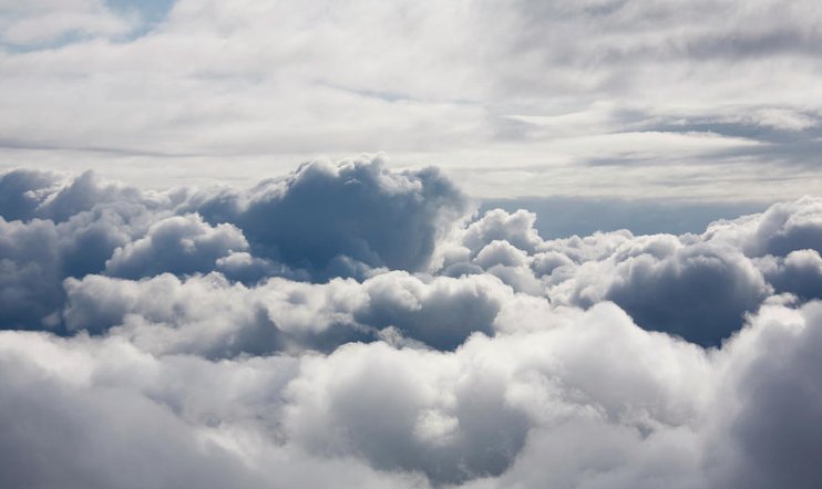 White puffy clouds blue sky